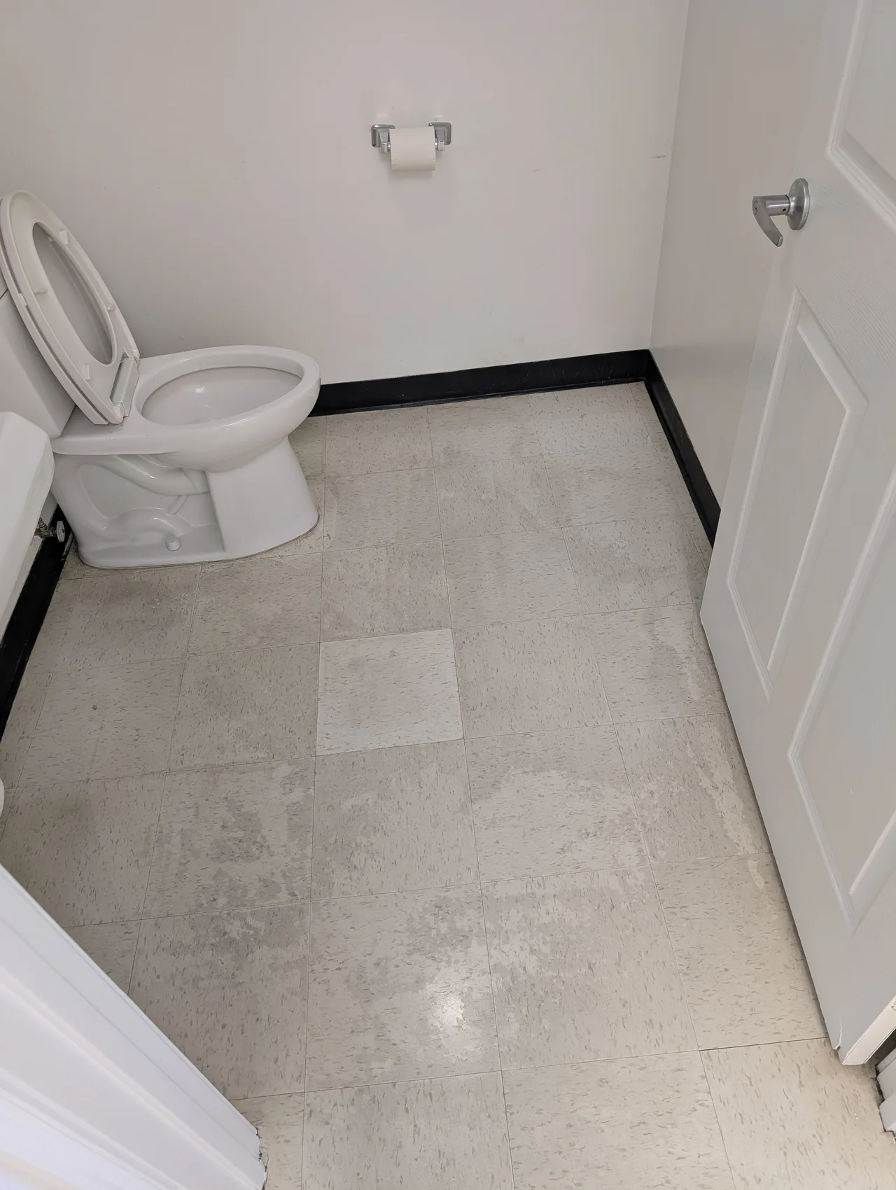 VCT Strip & Recoat before - Total Cleaning Service