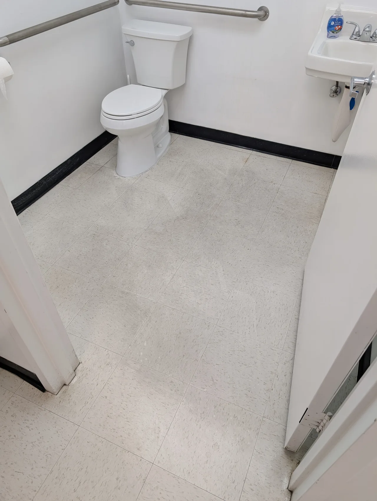 VCT Strip & Recoat before - Total Cleaning Service
